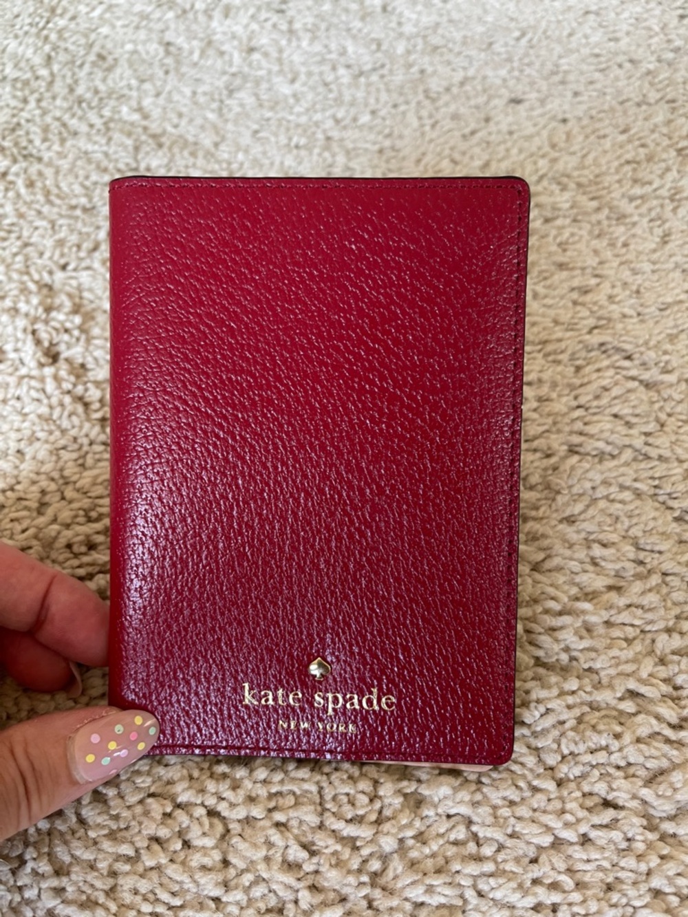 kate spade Red Pebbled Leather Passport Cover with Gold Logo